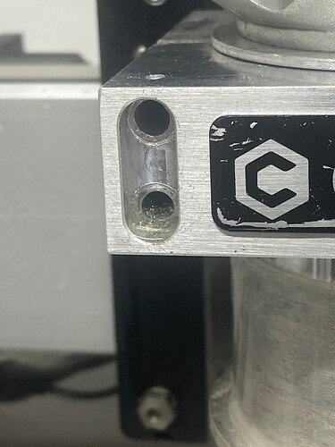 Culprit hole at top of spindle mount