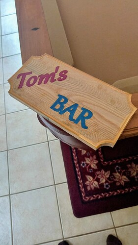 tom bar sign